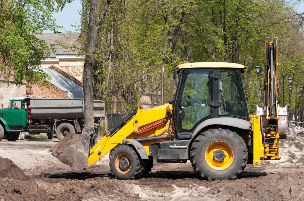 Dump Trucks, Loaders, and Backhoes